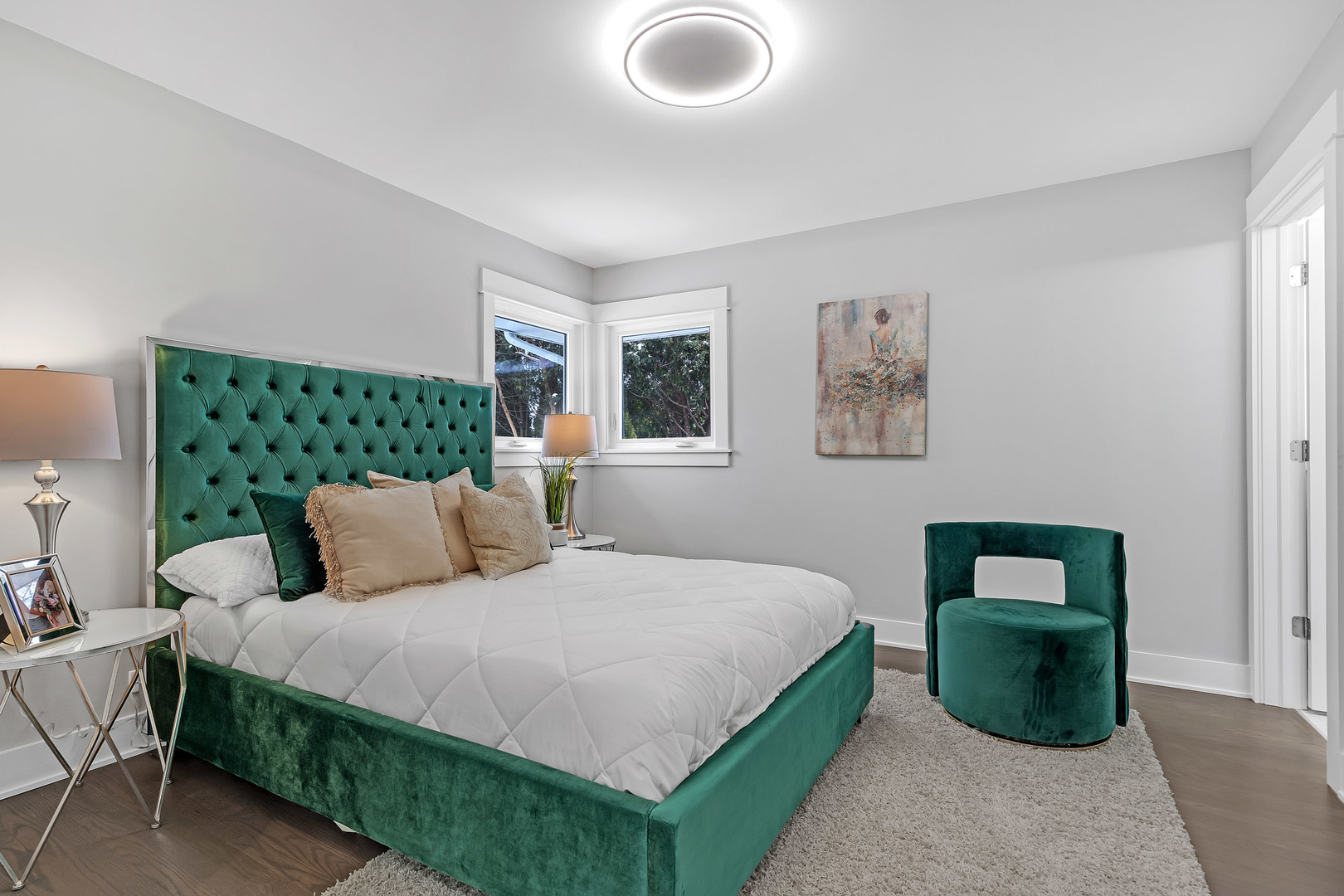 1814 Oakton Street Park Ridge, IL 60068 - Photo 16 of 30 a bedroom with a bed and a painting on the wall