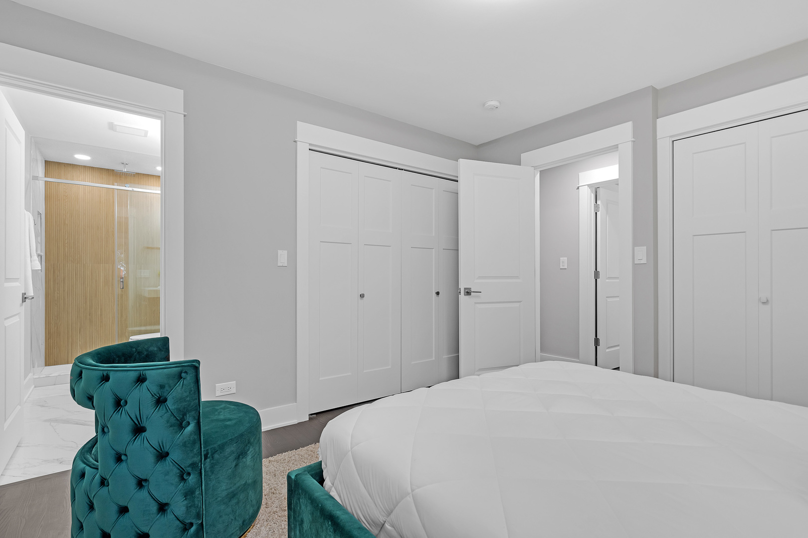 1814 Oakton Street Park Ridge, IL 60068 - Photo 17 of 30 a bedroom with a bed and a chair