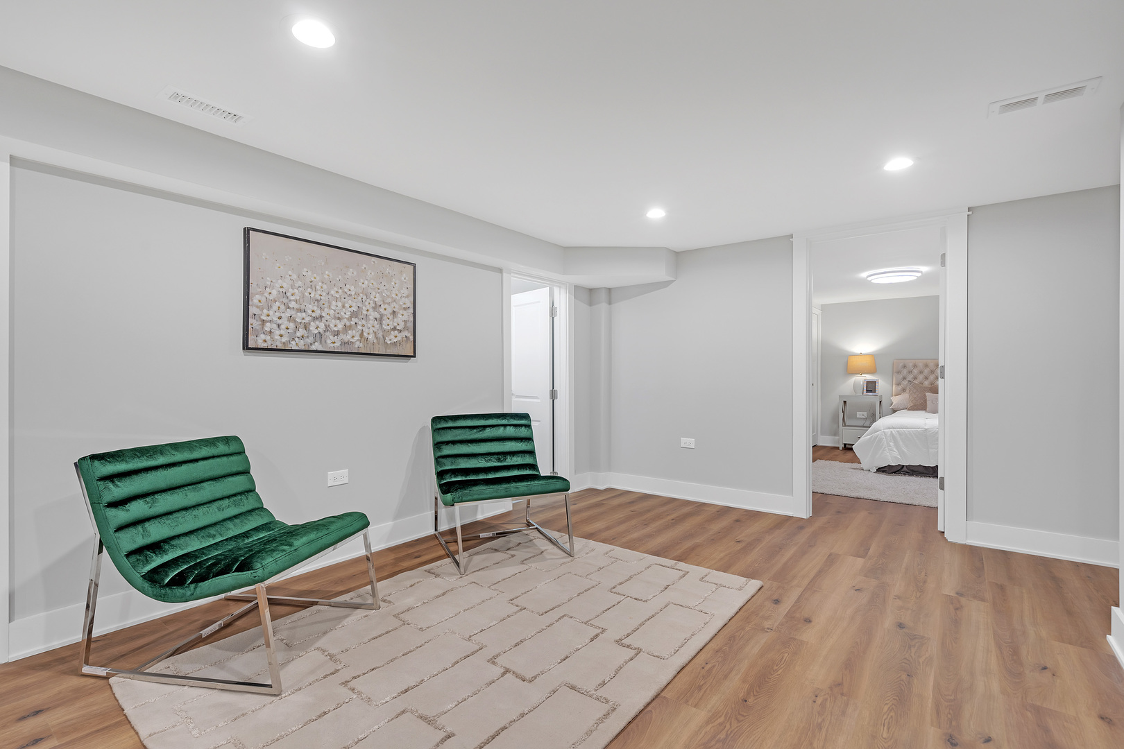 1814 Oakton Street Park Ridge, IL 60068 - Photo 23 of 30 a bedroom with a bed and a chair