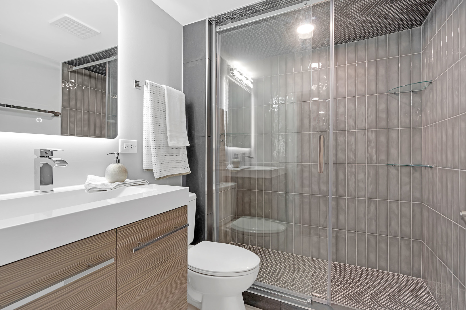 1814 Oakton Street Park Ridge, IL 60068 - Photo 24 of 30 a bathroom with a sink a toilet and shower