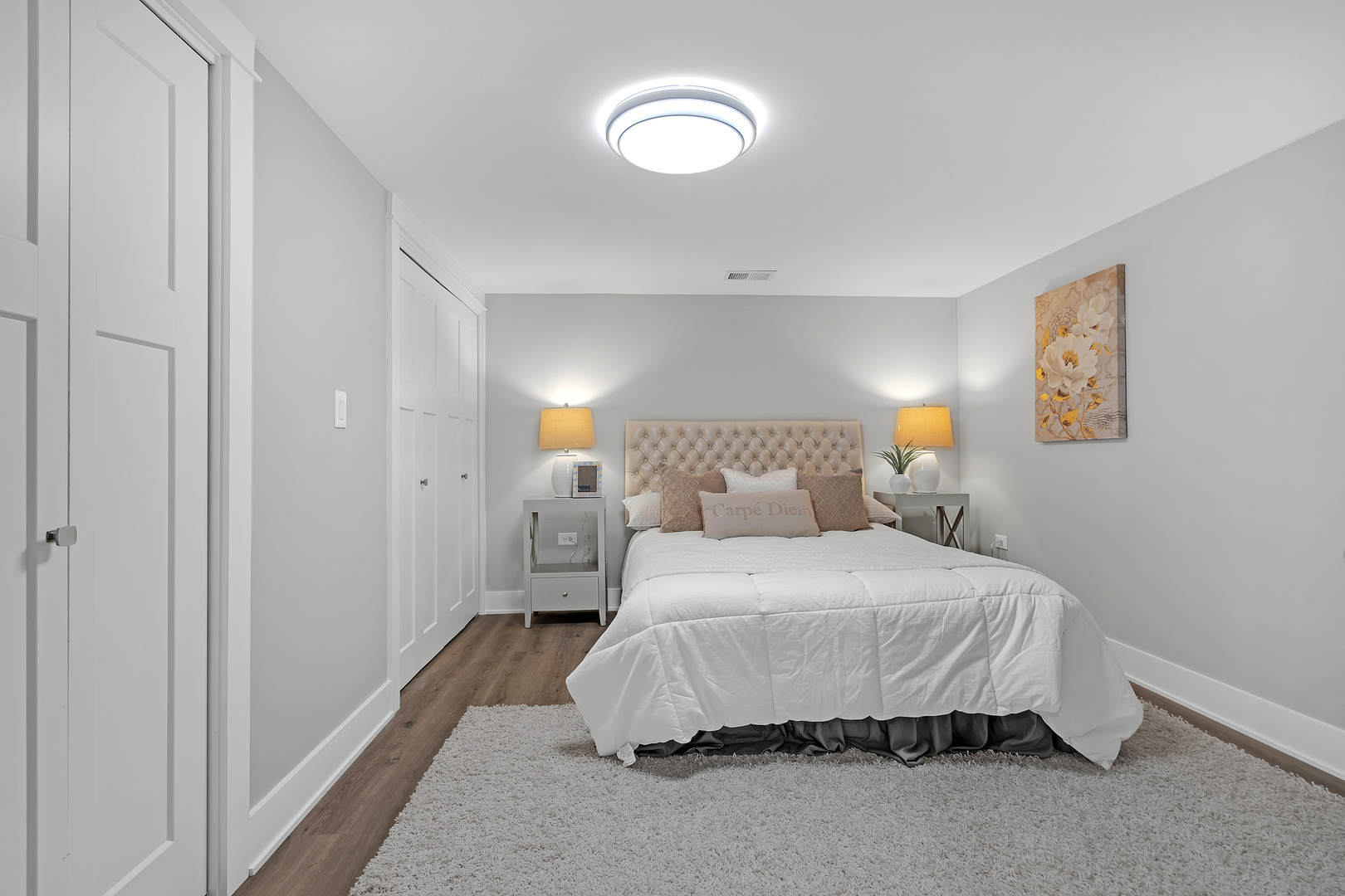 1814 Oakton Street Park Ridge, IL 60068 - Photo 25 of 30 a bedroom with a bed and a painting