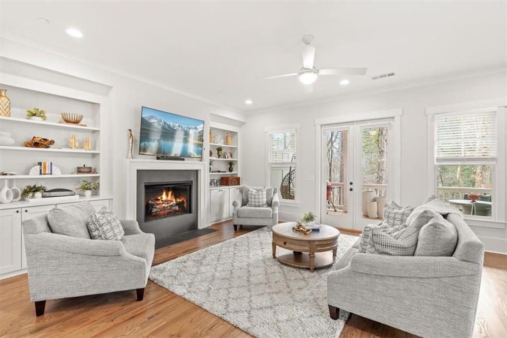 1049 Endeavour Court Marietta, GA 30064 - Photo 15 of 39 a living room with furniture and a fireplace