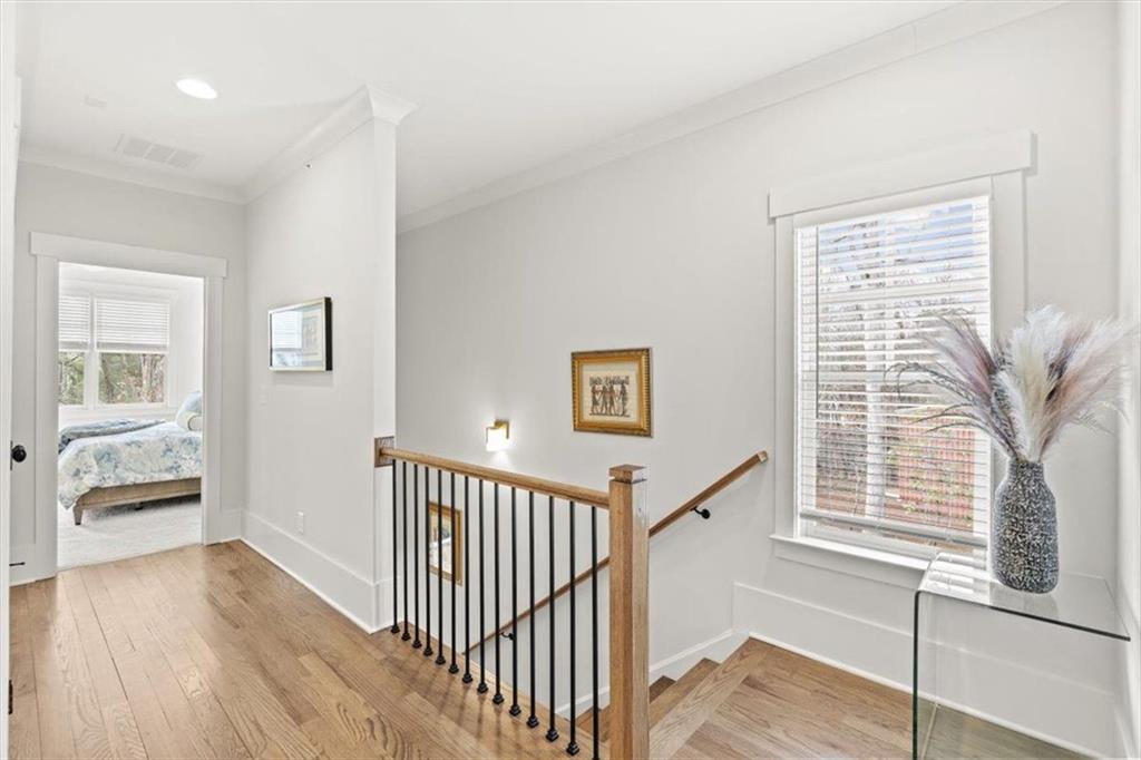 1049 Endeavour Court Marietta, GA 30064 - Photo 20 of 39 a view of a hallway with windows and stairs