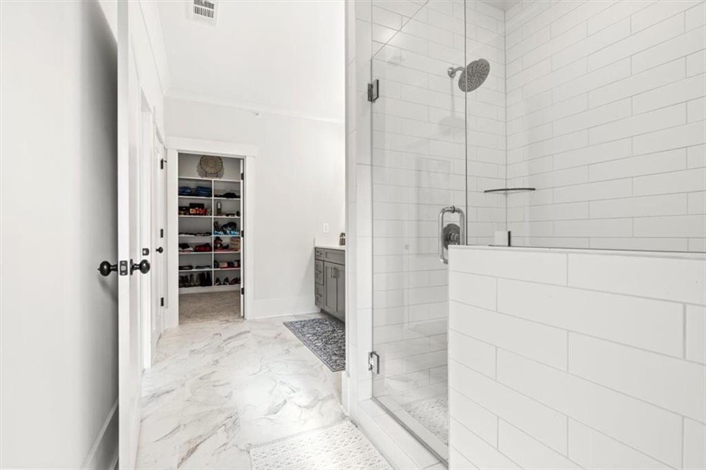 1049 Endeavour Court Marietta, GA 30064 - Photo 24 of 39 a bathroom with a shower