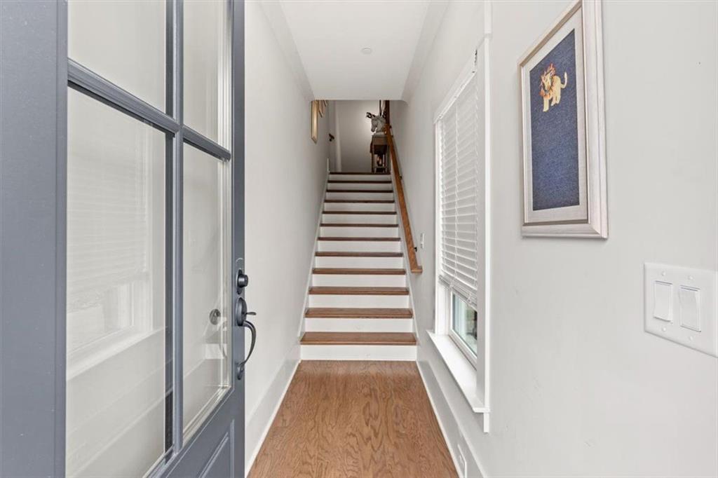 1049 Endeavour Court Marietta, GA 30064 - Photo 8 of 39 a view of a hallway with wooden floor and entryway