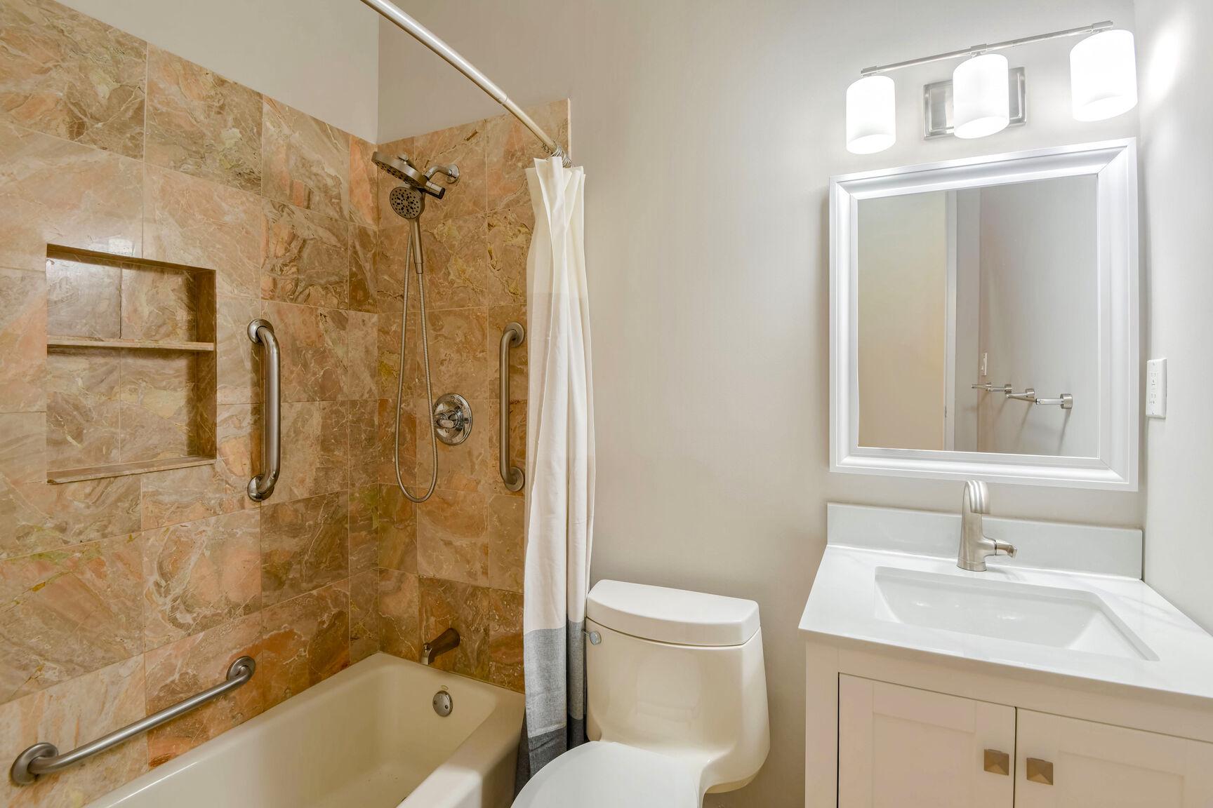 14645 Good Hope Road Silver Spring, MD 20905 - Photo 19 of 26 Elegant hall bathroom with modern finishes.