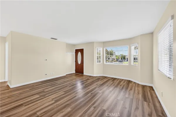 a view of a room with shelf on the wall