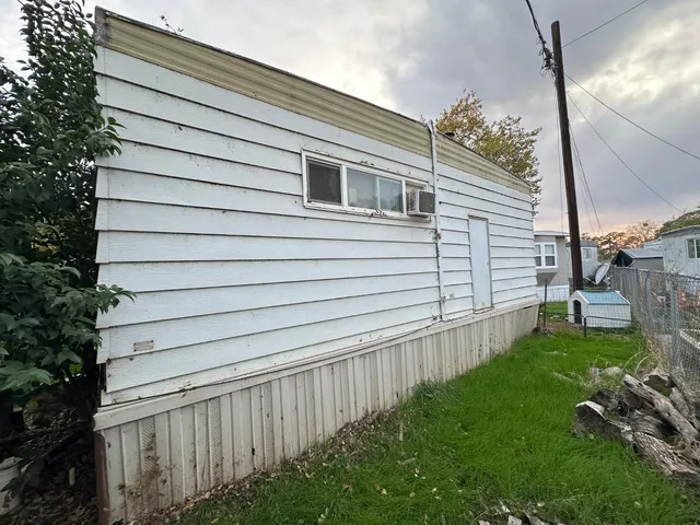 a view of a back yard of the house