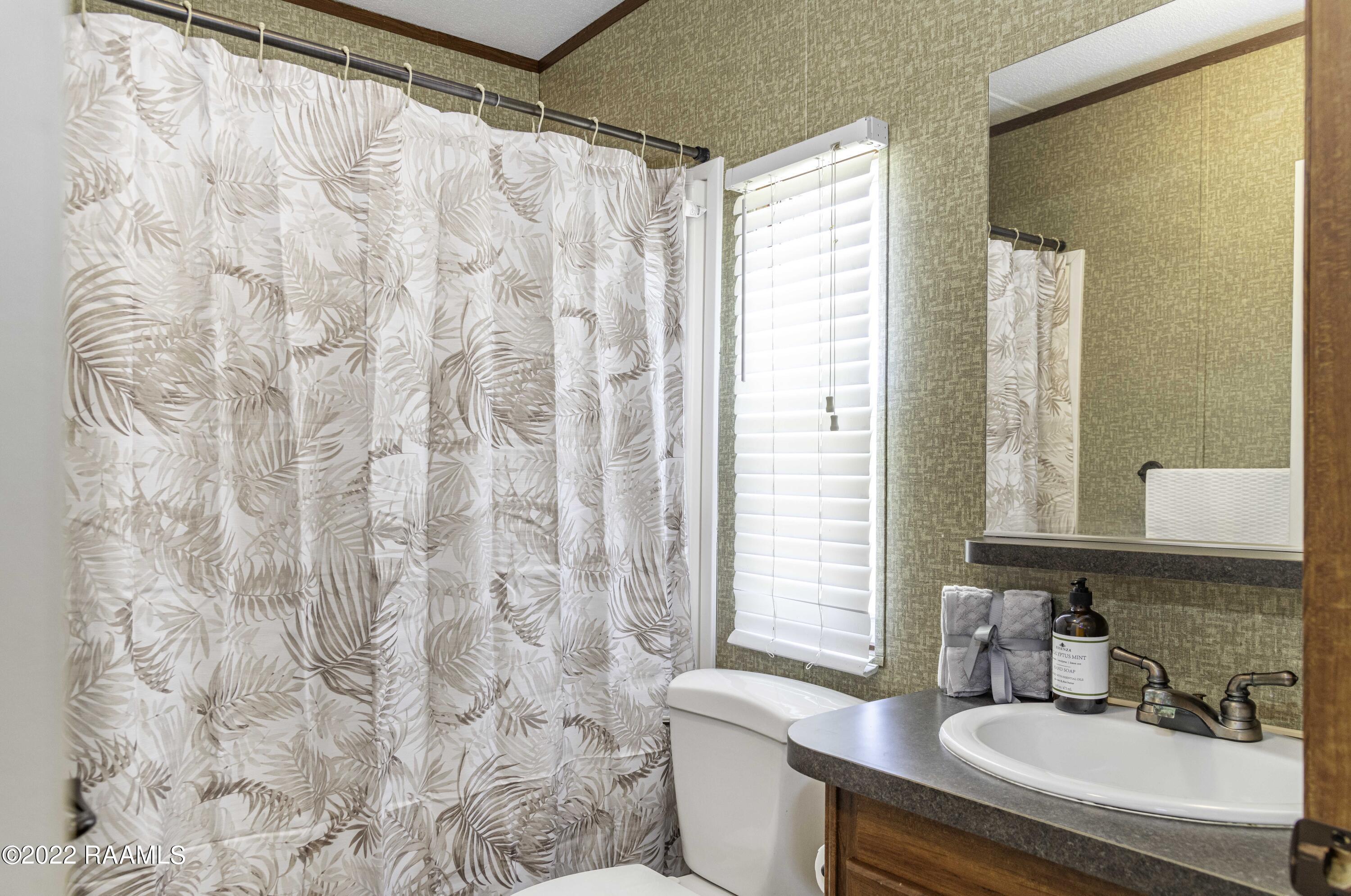 1072 Eddie Ray Road Breaux Bridge, LA 70517 - Photo 23 of 31 Guest Bath 1