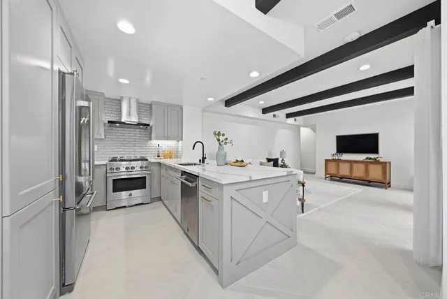 a bathroom with a toilet a sink and a mirror