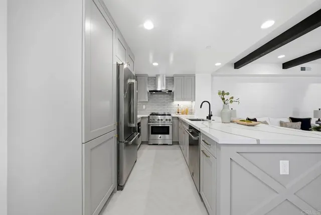 a bathroom with a toilet sink vanity and mirror