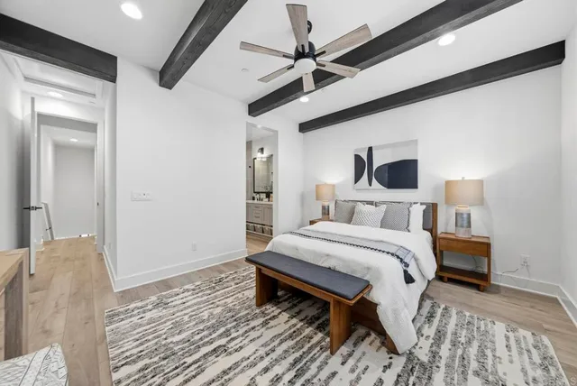 a front view of a house with yard and windows