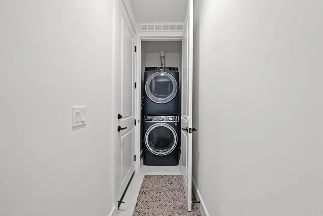 an aerial view of residential building with parking space