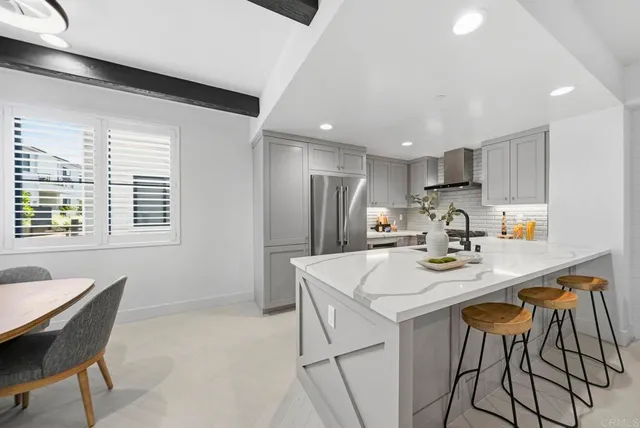 a view of a dining room with furniture and window