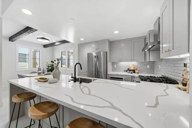 a bathroom with a toilet and a mirror