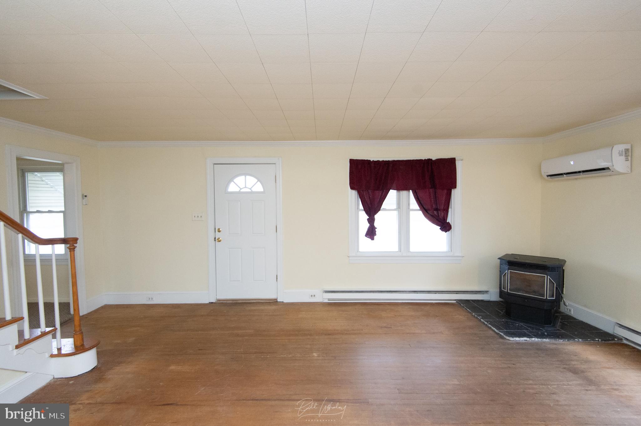 5902 Shiloh Church Hurlock Road Hurlock, MD 21643 - Photo 11 of 21 an empty room with windows and closet