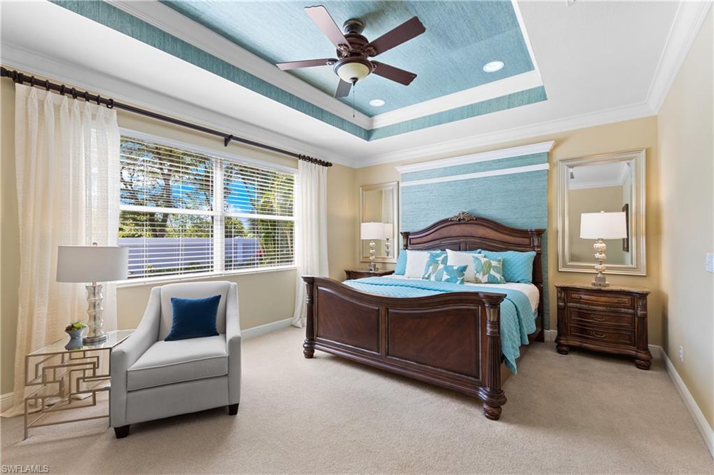 20398 Foxworth Circle Estero, FL 33928 - Photo 11 of 50 a bedroom with a bed couch and window