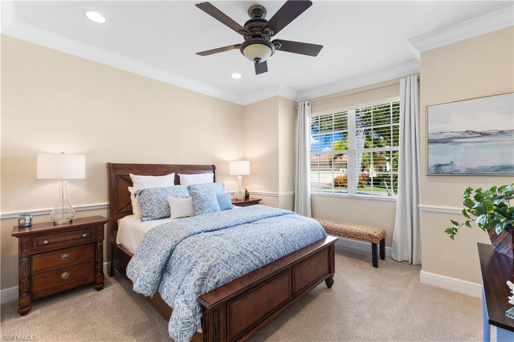 20398 Foxworth Circle Estero, FL 33928 - Photo 16 of 50 a bedroom with a bed and a window
