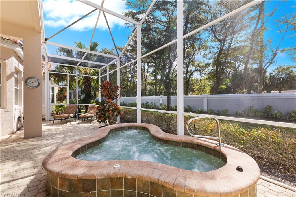 20398 Foxworth Circle Estero, FL 33928 - Photo 27 of 50 a view of a swimming pool with a patio