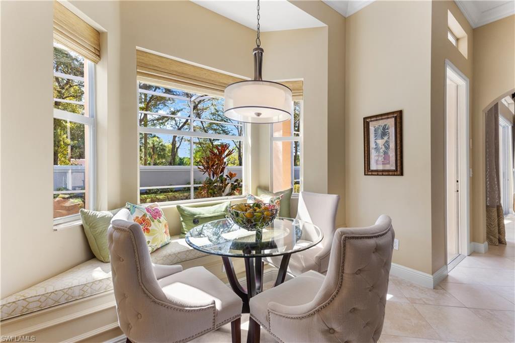 20398 Foxworth Circle Estero, FL 33928 - Photo 28 of 50 a dining room with furniture and window