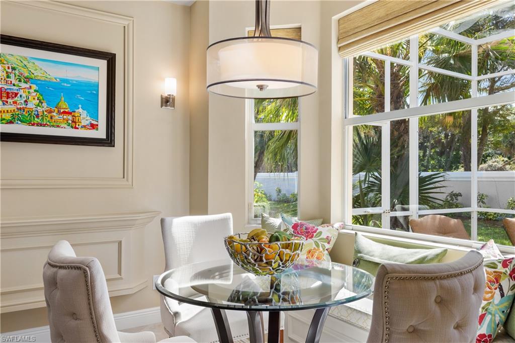 20398 Foxworth Circle Estero, FL 33928 - Photo 29 of 50 a dining room with furniture and window