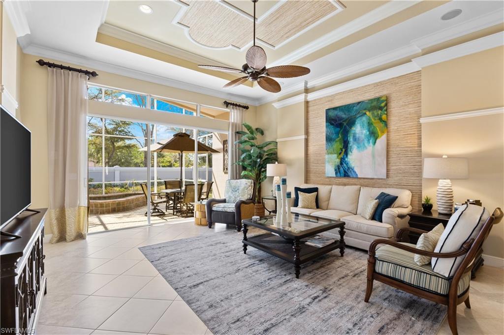 20398 Foxworth Circle Estero, FL 33928 - Photo 3 of 50 a living room with patio furniture