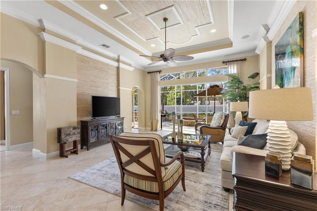 20398 Foxworth Circle Estero, FL 33928 - Photo 5 of 50 a living room with furniture and a flat screen tv