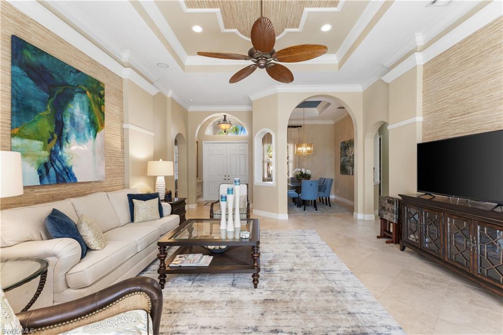 20398 Foxworth Circle Estero, FL 33928 - Photo 7 of 50 a living room with furniture and a flat screen tv
