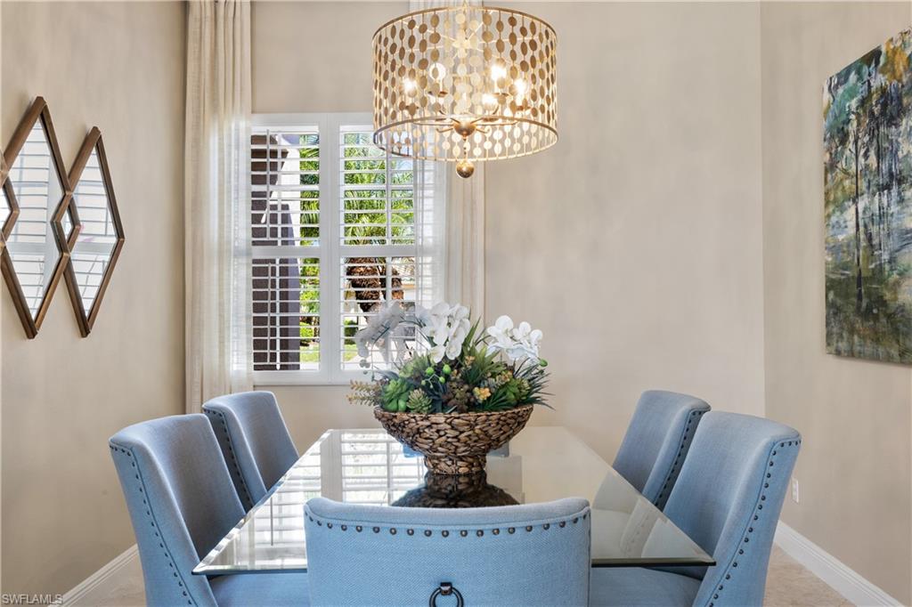 20398 Foxworth Circle Estero, FL 33928 - Photo 10 of 50 a view of a dining room with furniture window and outside view