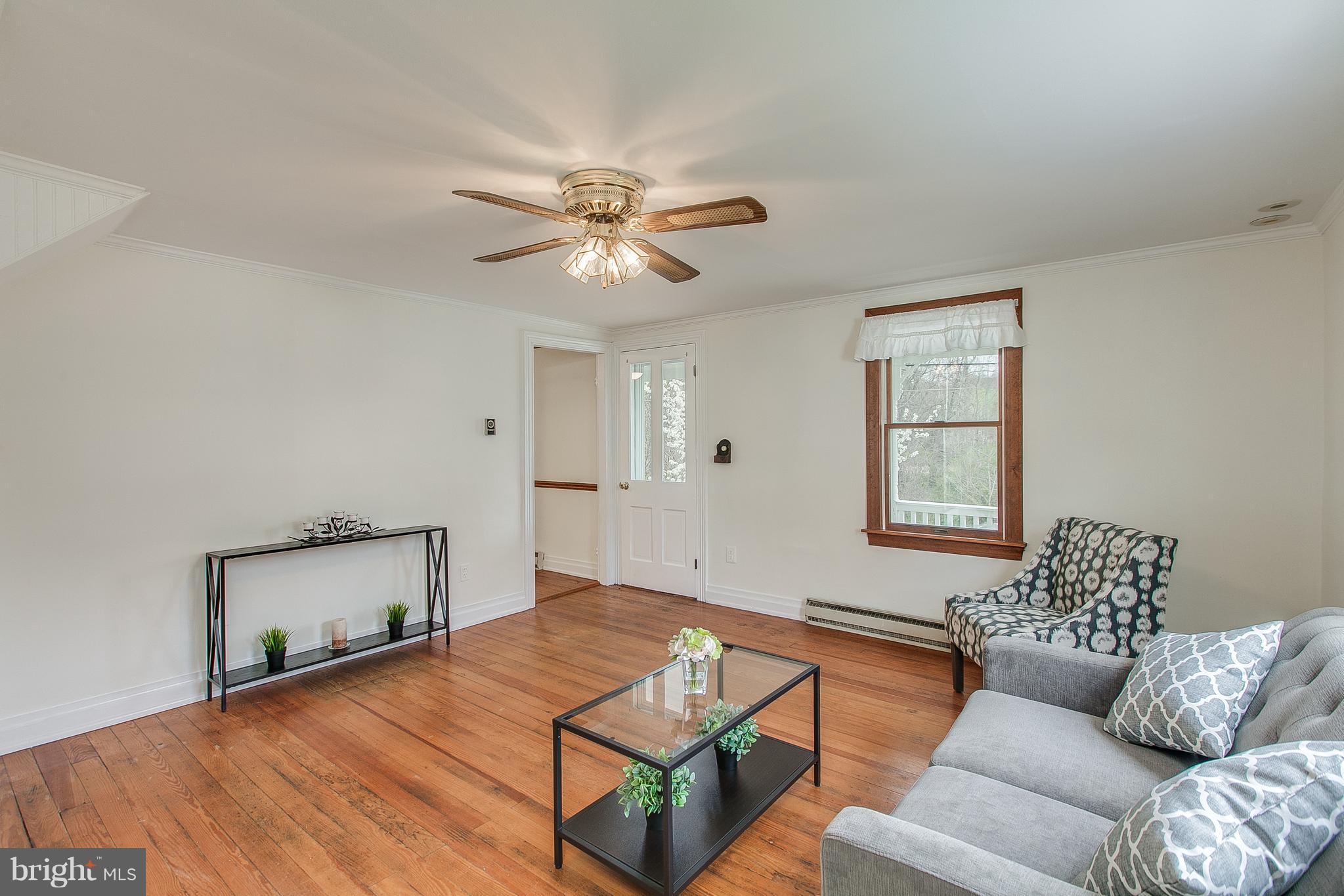 27441 Clarksburg Road Damascus, MD 20872 - Photo 2 of 25 Living Room hardwood floor throughout