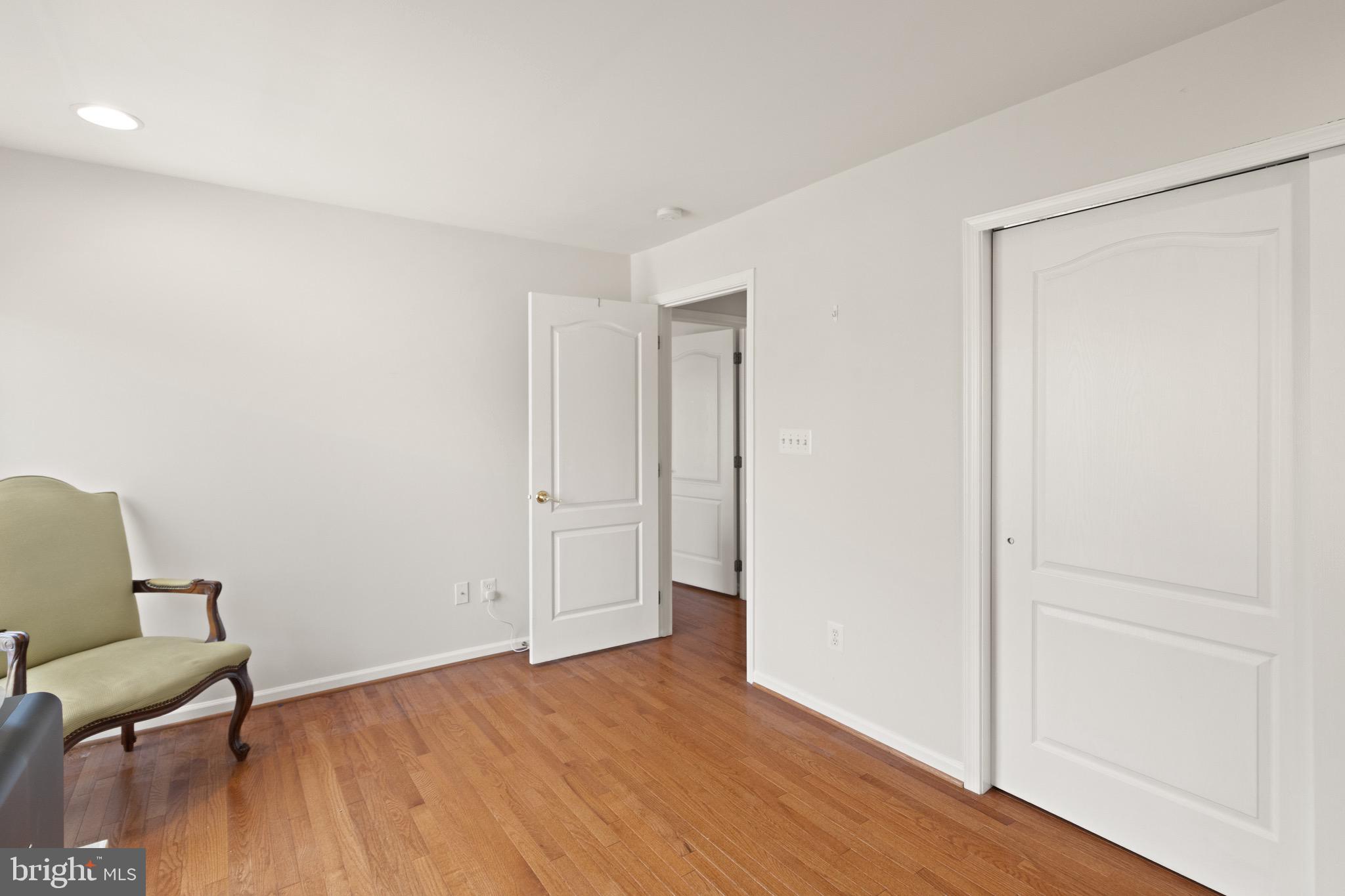 5652 Wheelwright Way Haymarket, VA 20169 - Photo 22 of 32 a view of room with hardwood floor and lounge chair