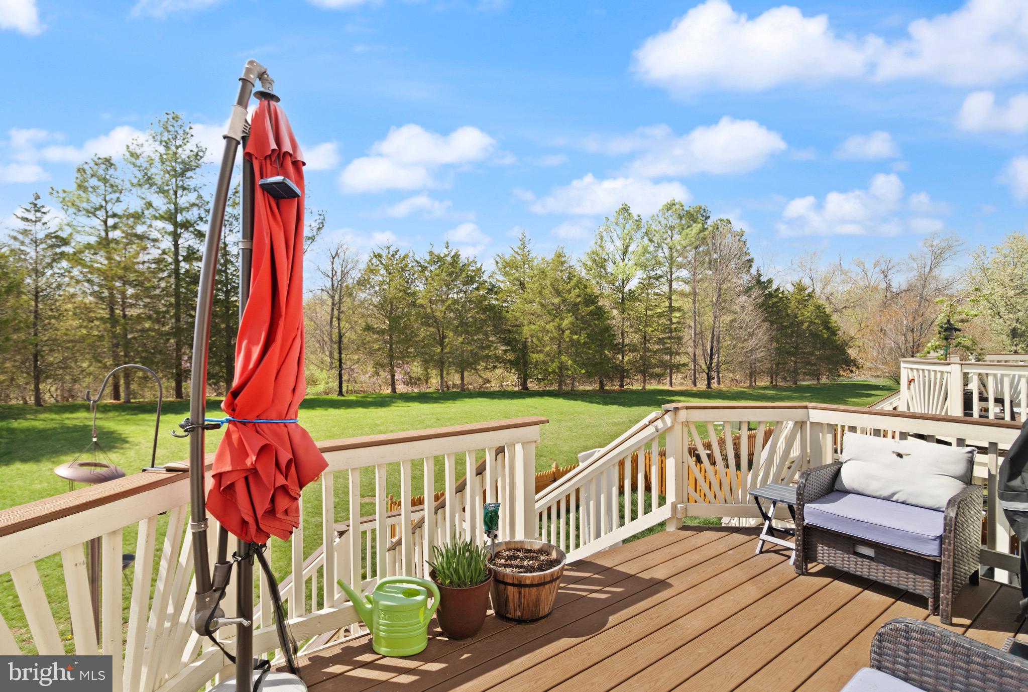 5652 Wheelwright Way Haymarket, VA 20169 - Photo 29 of 32 a view of a sitting area with swimming pool and sitting area