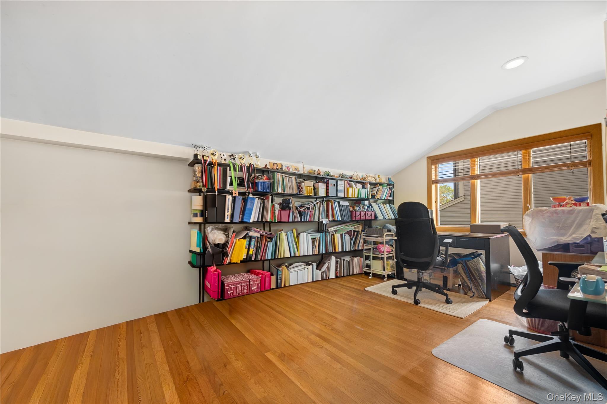 150 Roxton Road Plainview, NY 11803 - Photo 10 of 25 a view of a workspace with furniture and a window