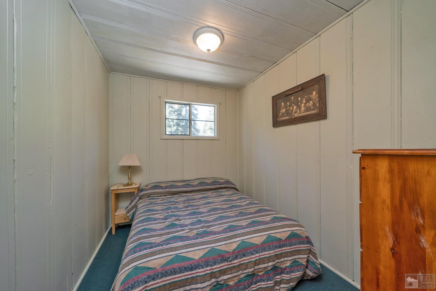 26 Sciots Tract Twin Bridges, CA 95735 - Photo 18 of 27 a bedroom with a bed and a window