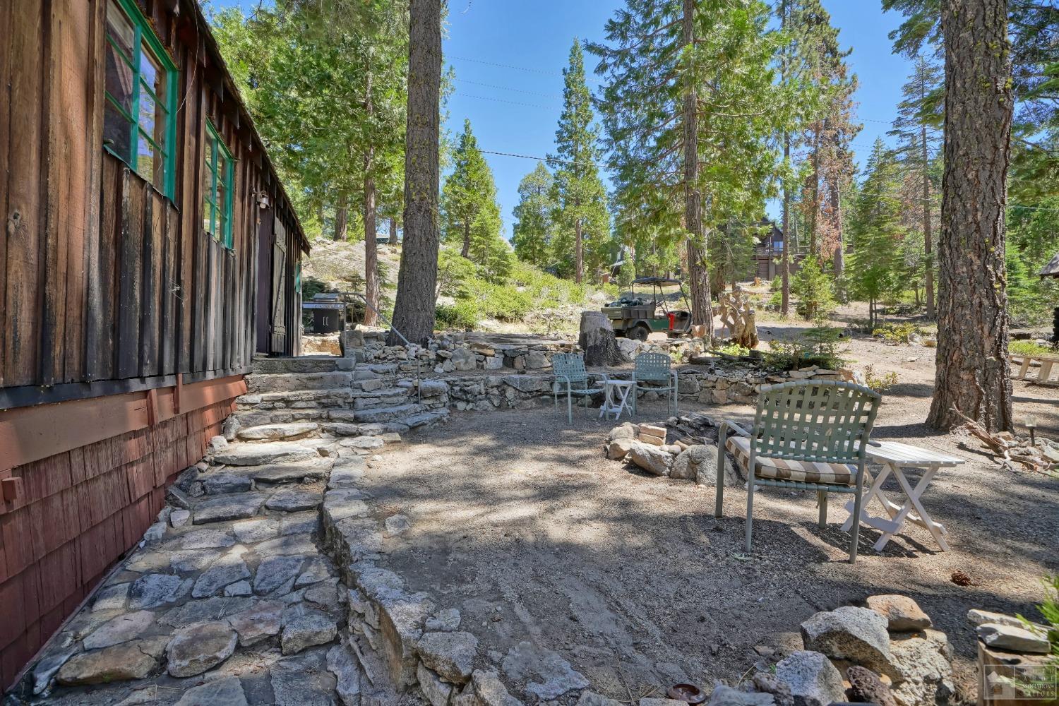 26 Sciots Tract Twin Bridges, CA 95735 - Photo 25 of 27 a view of a chairs and tables in the backyard