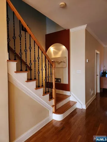 a bathroom with a sink toilet a mirror and shower