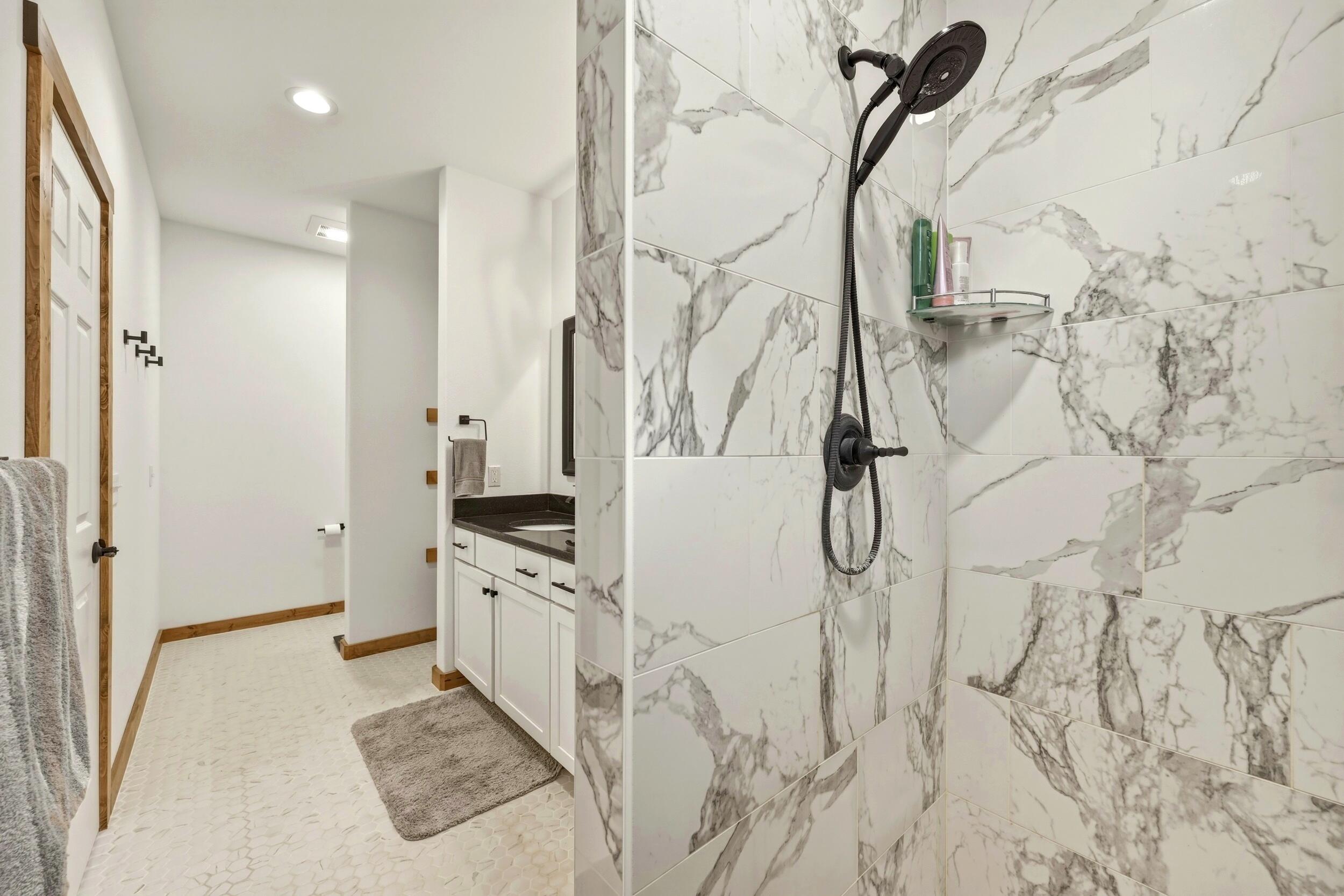 1353 Stoneridge Drive Ranchester, WY 82839 - Photo 21 of 43 large tiled walk-in shower in primary