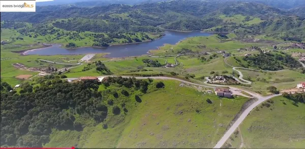 a view of a water with a mountain