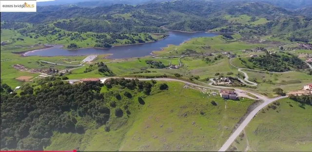 a view of a lake with a mountain in the background