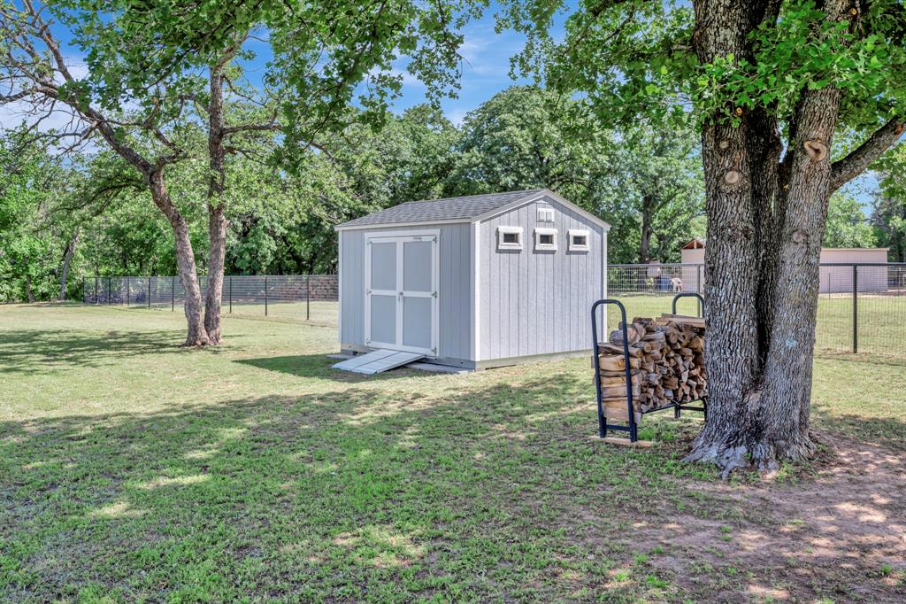 3224 North Cardinal Road Azle, TX 76020 - Photo 34 of 40 Brand new shed. Installed approximately one month ago.