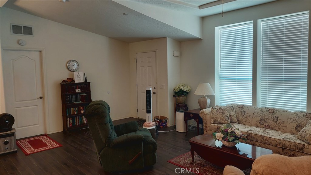 4250 Osborn Road Flournoy, CA 96021 - Photo 25 of 68 a living room with furniture and wooden floor