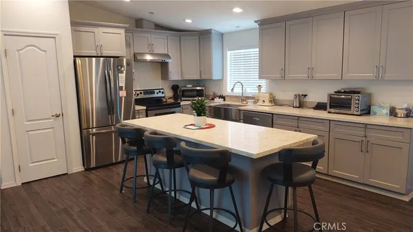 a bedroom with bed and a ceiling fan