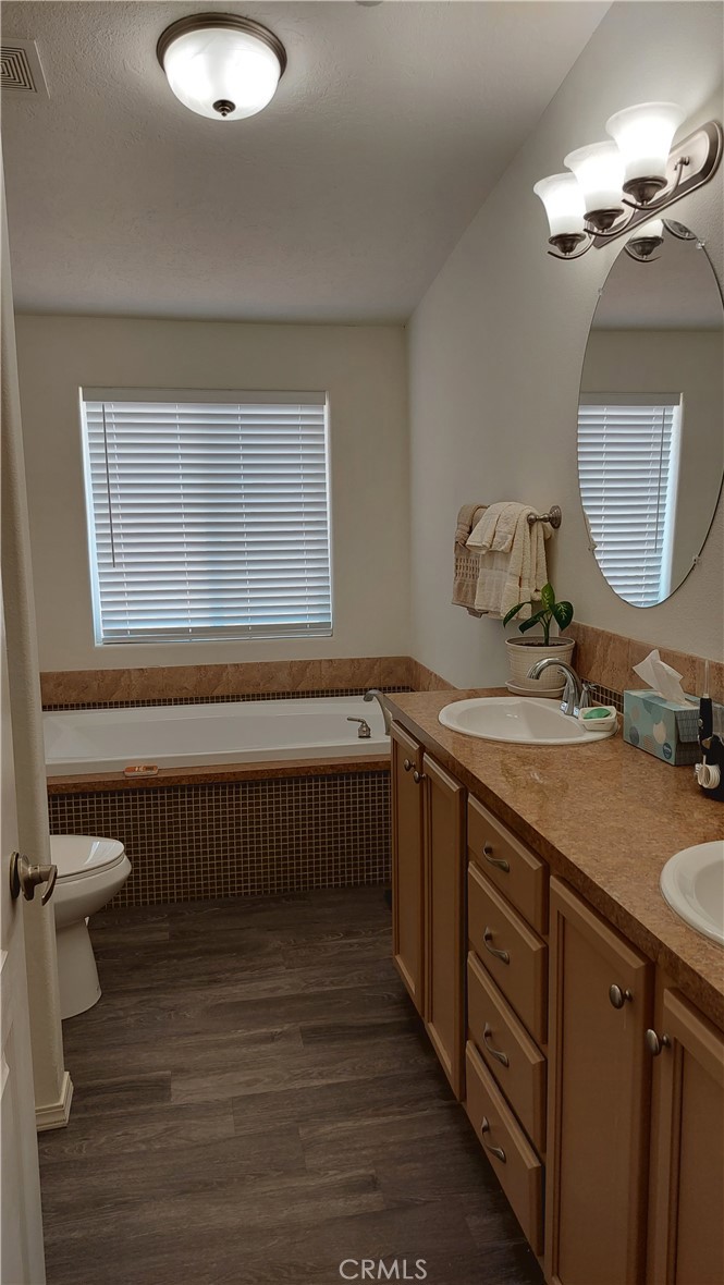 4250 Osborn Road Flournoy, CA 96021 - Photo 39 of 68 a bathroom with a sink and a mirror