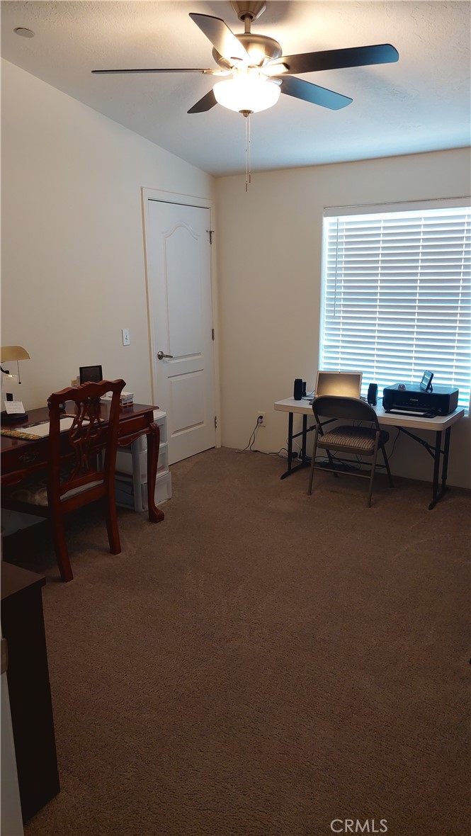 4250 Osborn Road Flournoy, CA 96021 - Photo 51 of 68 a living room with furniture and a window