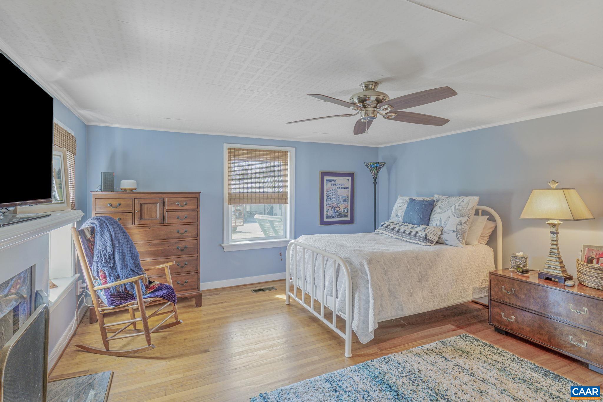 1353 Banton Shop Road Dillwyn, VA 23936 - Photo 16 of 57 a bedroom with a bed and a flat screen tv