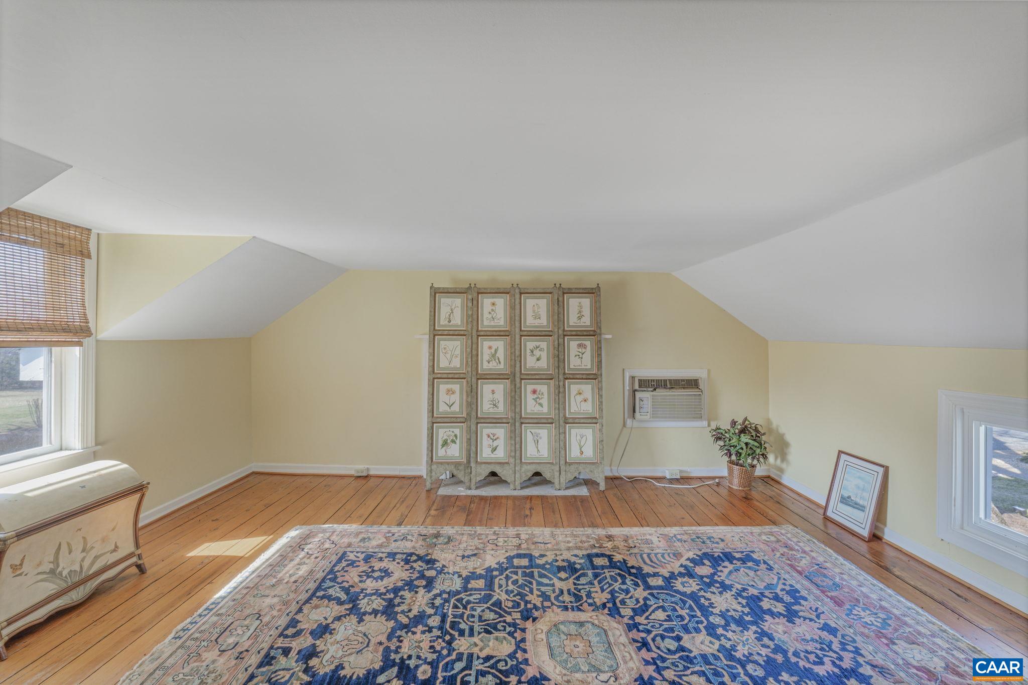 1353 Banton Shop Road Dillwyn, VA 23936 - Photo 27 of 57 a bedroom with a bed and wooden floor