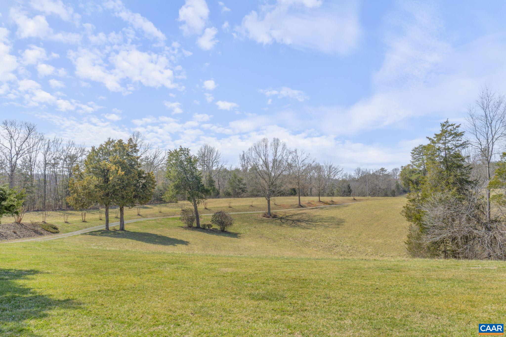 1353 Banton Shop Road Dillwyn, VA 23936 - Photo 46 of 57 a view of a lake with houses in the back