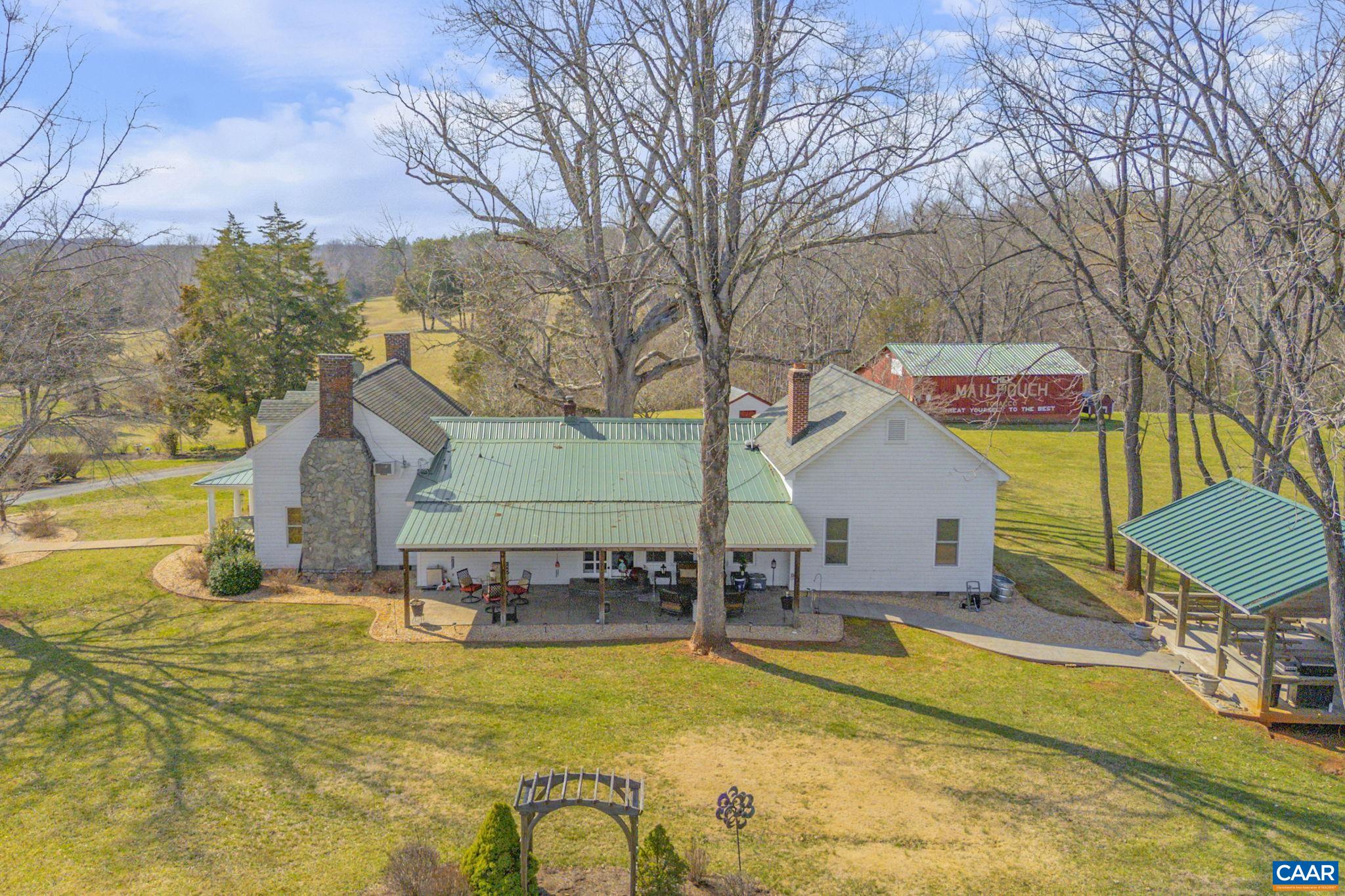 1353 Banton Shop Road Dillwyn, VA 23936 - Photo 49 of 57 a swimming pool with outdoor seating and yard