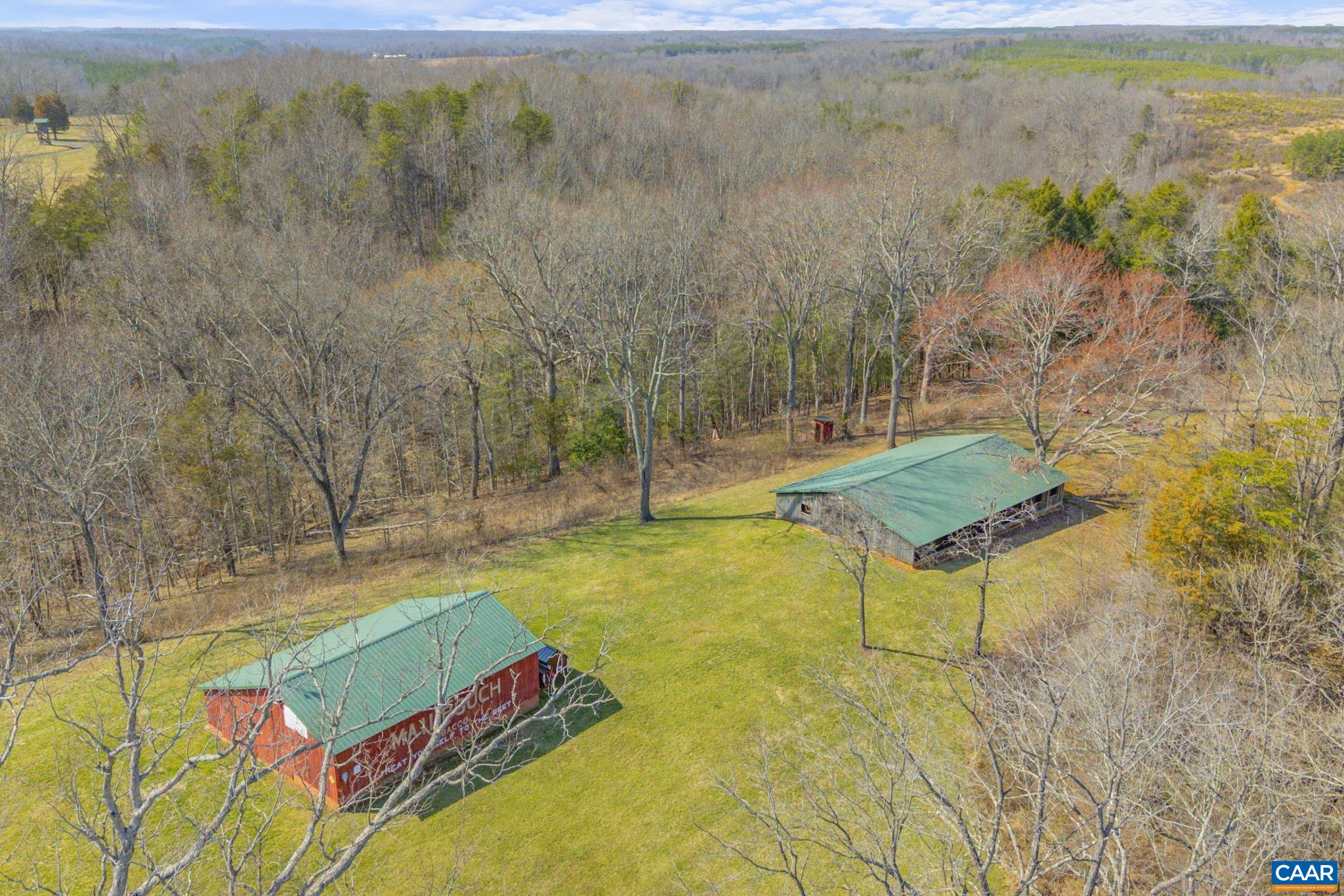 1353 Banton Shop Road Dillwyn, VA 23936 - Photo 52 of 57 a backyard of a house with table and chairs