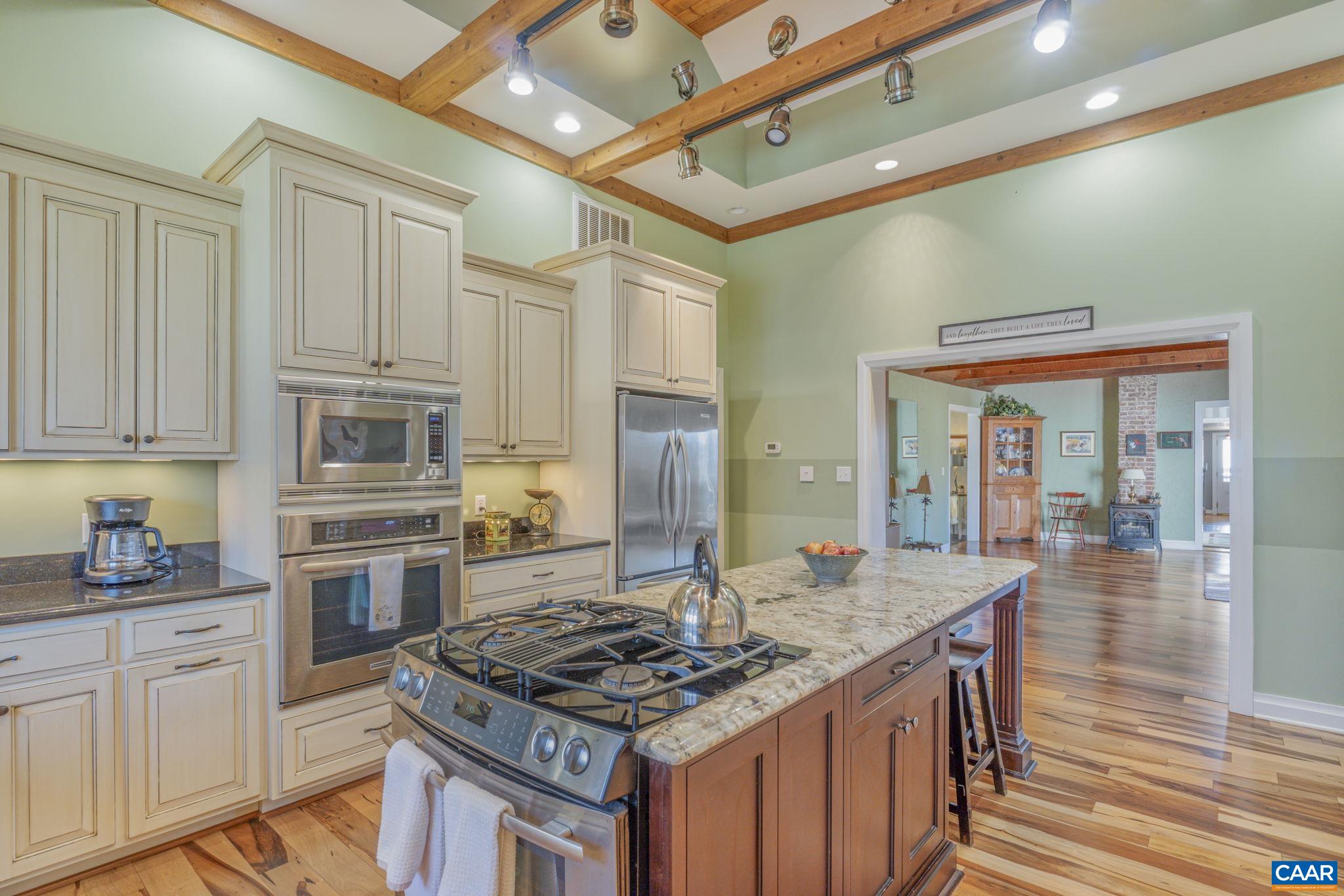 1353 Banton Shop Road Dillwyn, VA 23936 - Photo 10 of 57 a kitchen with stainless steel appliances granite countertop a stove and a sink
